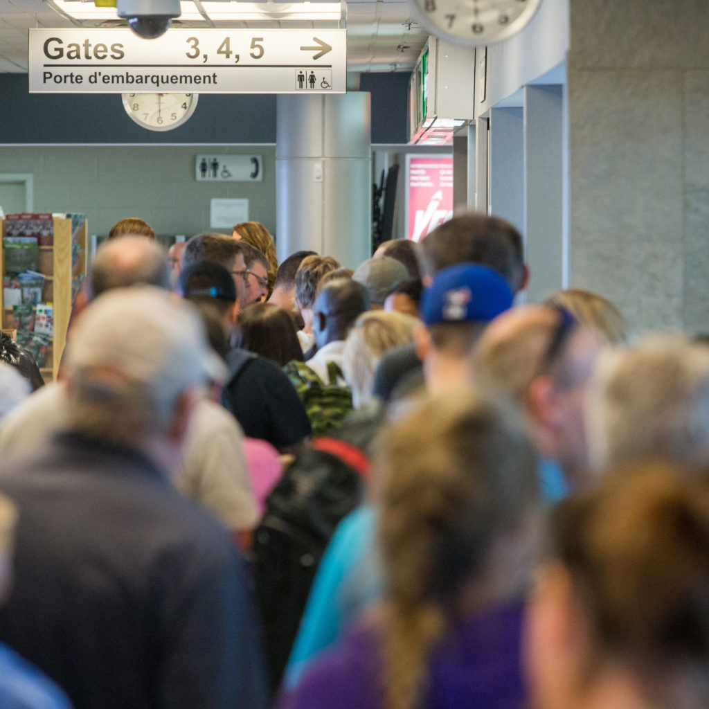 Passengers line up at the Fredericton International Airport