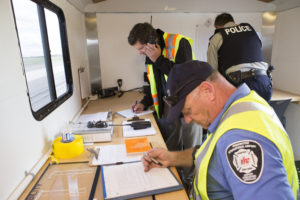 Airport emergency response staff coordinating with RCMP during Emergency Exercises