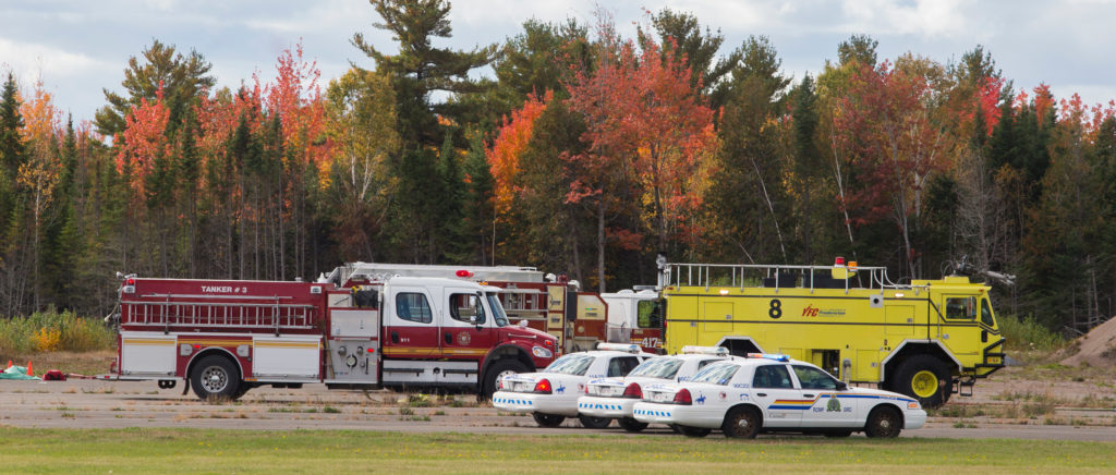 Emergency responders come together to coordinate training during an exercise at the Fredericton International Airport.