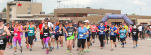 Runners take off at the 2016 YFC Runway Run at the Fredericton International Airport